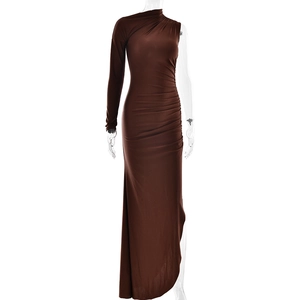 Detail of a brown one-shoulder long sleeve dress with high slit and pleated texture