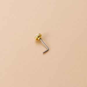 Minimalist 20G L-shaped stainless steel nose stud with a polished white opal top inlay