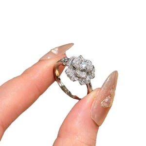 Elegant silver camellia flower ring with sparkling zircon stones for a minimalist look