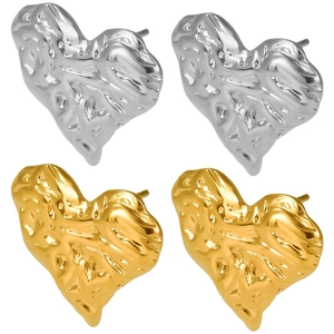 Textured gold and silver heart stud earrings with irregular hammered metallic finish