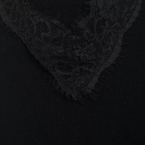 Women's slim fit V-neck long sleeve knit top featuring elegant black floral lace trim