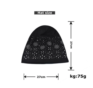 Detail view of winter black beanie showing snowflake rhinestone pattern and 27cm size marking