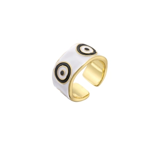 Macro shot of evil eye pattern with colorful enamel on golden adjustable open ring