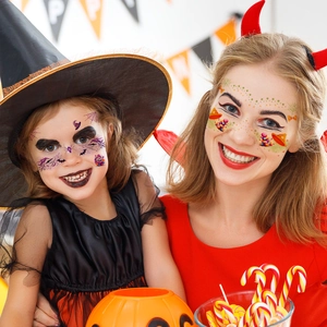 Kids Halloween face tattoos featuring bats and spiders for party makeup and roleplay