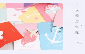Detail showing a variety of creative mini greeting cards with colorful heart and fruit patterns