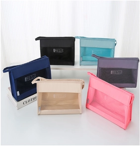 Detailed set of six colorful mesh travel storage bags for clothes and toiletries