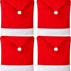 Set of 4 red Santa Claus hat chair covers in non-woven fabric for Christmas dining decor