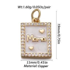 Close-up of gold-plated Mama pendant with cubic zirconia and precise size dimensions