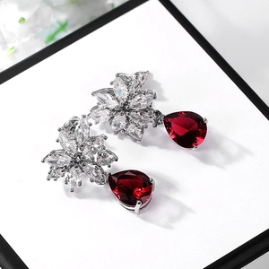 Elegant pear-shaped red zircon drop earrings with sparkling clear cubic zirconia accents