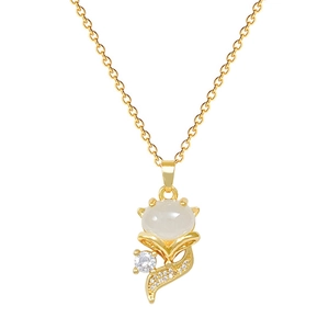 Elegant gold titanium steel necklace with a crystal fox pendant and white cat-eye stone