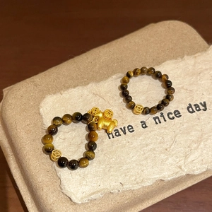 Tiger eye beaded ring with golden pig charm and lucky coin in New Chinese style