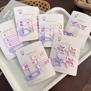 Set of pastel cream hair clips in heart and star shapes for women and girls