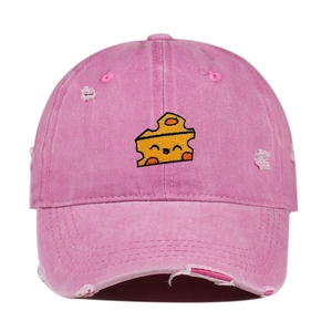 Pink distressed washed cotton baseball cap with yellow cheese embroidery and torn details