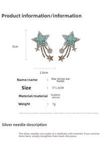 Detailed view of silver star zircon ear hooks featuring blue stones and tassel chains