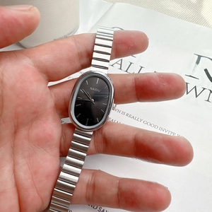 Elegant silver oval quartz watch with black dial and metal chain strap for women