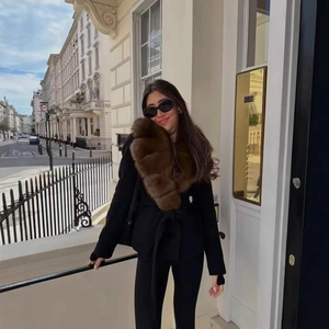 Elegant black coat with luxurious brown faux fur collar and waist tie belt