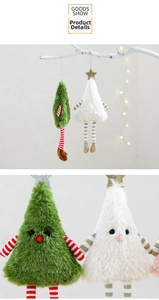 Detail of plush Christmas tree hangers with striped long legs and soft faux fur texture