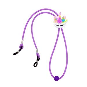 Close-up of purple elastic glasses strap featuring a cute 3D unicorn cartoon slider detail