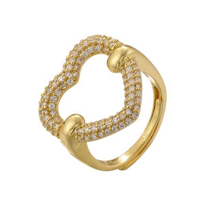 Macro detail of intertwined gold heart ring with pavé set cubic zirconia stones
