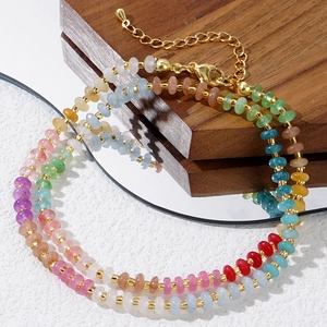Elegant gradient crystal necklace with colorful gemstone beads and gold metal spacers