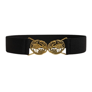Ethnic style elastic waist belt with a golden crane buckle on a black fabric strap