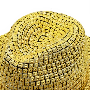 Golden stage fedora hat with metallic sequins and square rivets in minimalist style