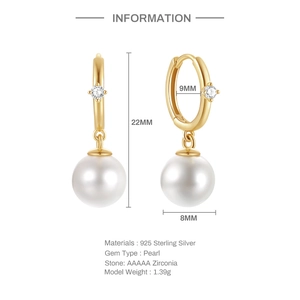 Detail view of gold 925 silver pearl earrings with zircon stones and size dimensions