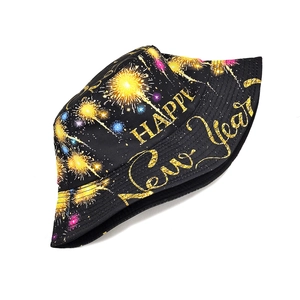 Detail view of Happy New Year printed bucket hat with festive fireworks and golden text