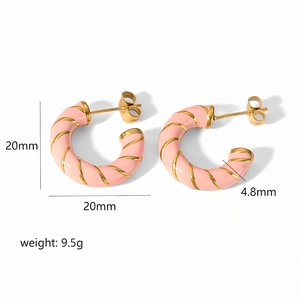 Pink enamel twisted hoop earrings with gold metal stripes and 20mm diameter size