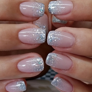 Short square nude pink press-on nails with silver glitter gradient and French tips