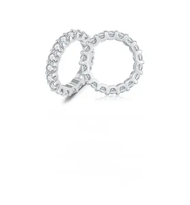 Macro detail of S925 sterling silver band with sparkling round cut moissanite row stones