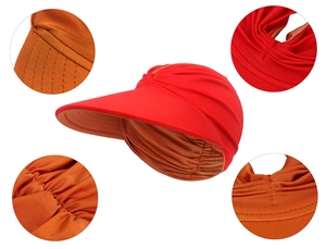 Detailed close-up showing fabric texture and sewing craft of the red pleated sun visor hat
