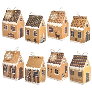 Detail of 8 different Christmas house gift boxes in brown kraft paper with snowflake tags
