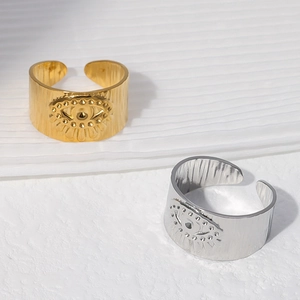 Bagues ouvertes œil maléfique en or et argent avec texture martelée verticale chic