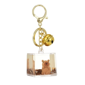 Creative Capybara quicksand keychain with gold bell and glitter liquid inside a clear cube