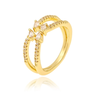 Golden double-layered ring featuring pear-cut cubic zirconia and micro-set stones