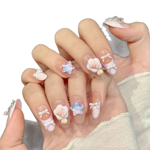 Handmade press-on nails with pink gradient, 3D stars, bows and cute bear decorations
