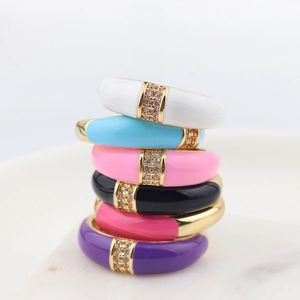 Set of six colorful enamel stackable rings with gold plating and sparkling CZ stones