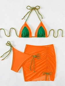 Three-piece bikini set with orange and green contrast colors and drawstring mini skirt