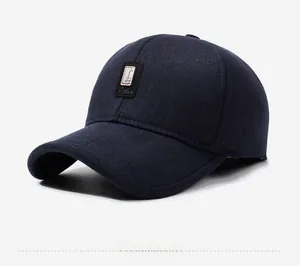 Detail of dark blue winter baseball cap with golf silhouette patch and wool texture