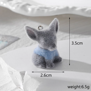 Macro view of blue flocked dachshund pendant with dimensions 3.5cm x 2.6cm and weight 6.5g