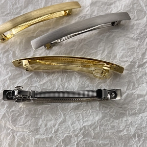 Minimalist alloy spring hair clips in gold and silver with brushed and polished finishes