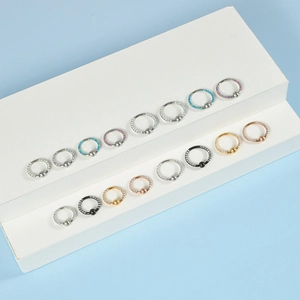Surgical steel BCR rings with opal and rhinestone stones in multiple metal colors