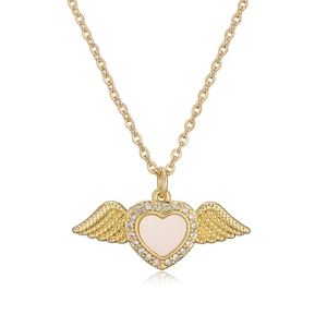 Macro detail of gold plated heart pendant with shell inlay and cubic zirconia angel wings
