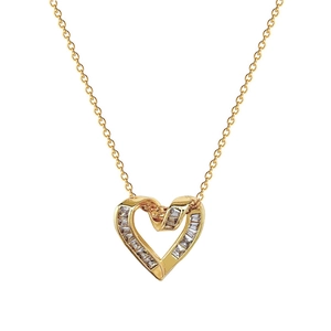 Elegant gold titanium steel heart necklace with baguette zircon stones on white background
