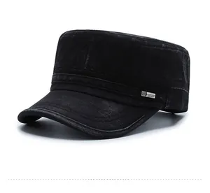 Detail of black washed denim flat top army cap with metallic logo and parallel stitching