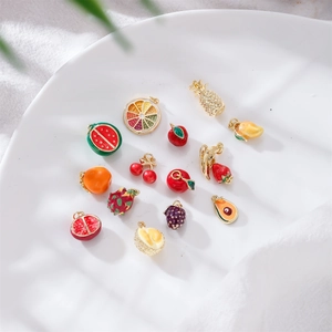 Colorful fruit enamel charms collection for DIY jewelry making including avocado and cherry