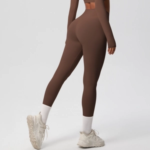 Rear view of chocolate brown high-waisted seamless yoga leggings in matte fabric