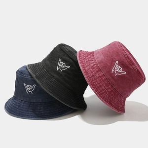 Foldable cotton bucket hats with Shaka hand embroidery in navy blue, black and wine red