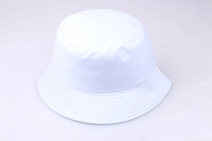 Top down flat lay of a white cotton canvas bucket hat with reinforced brim stitching